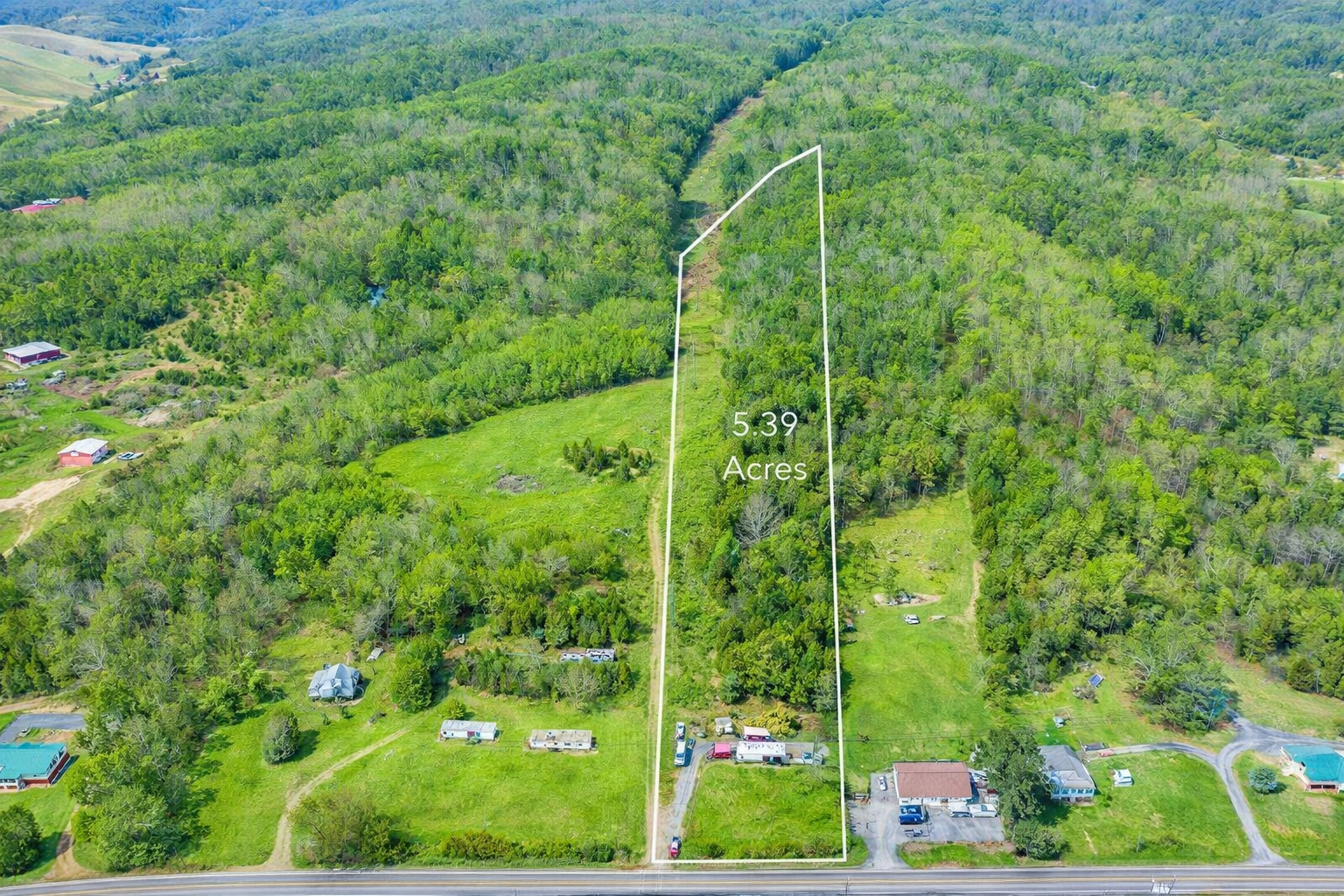 Aerial view of the 5.39-acre property on Highway 70 North