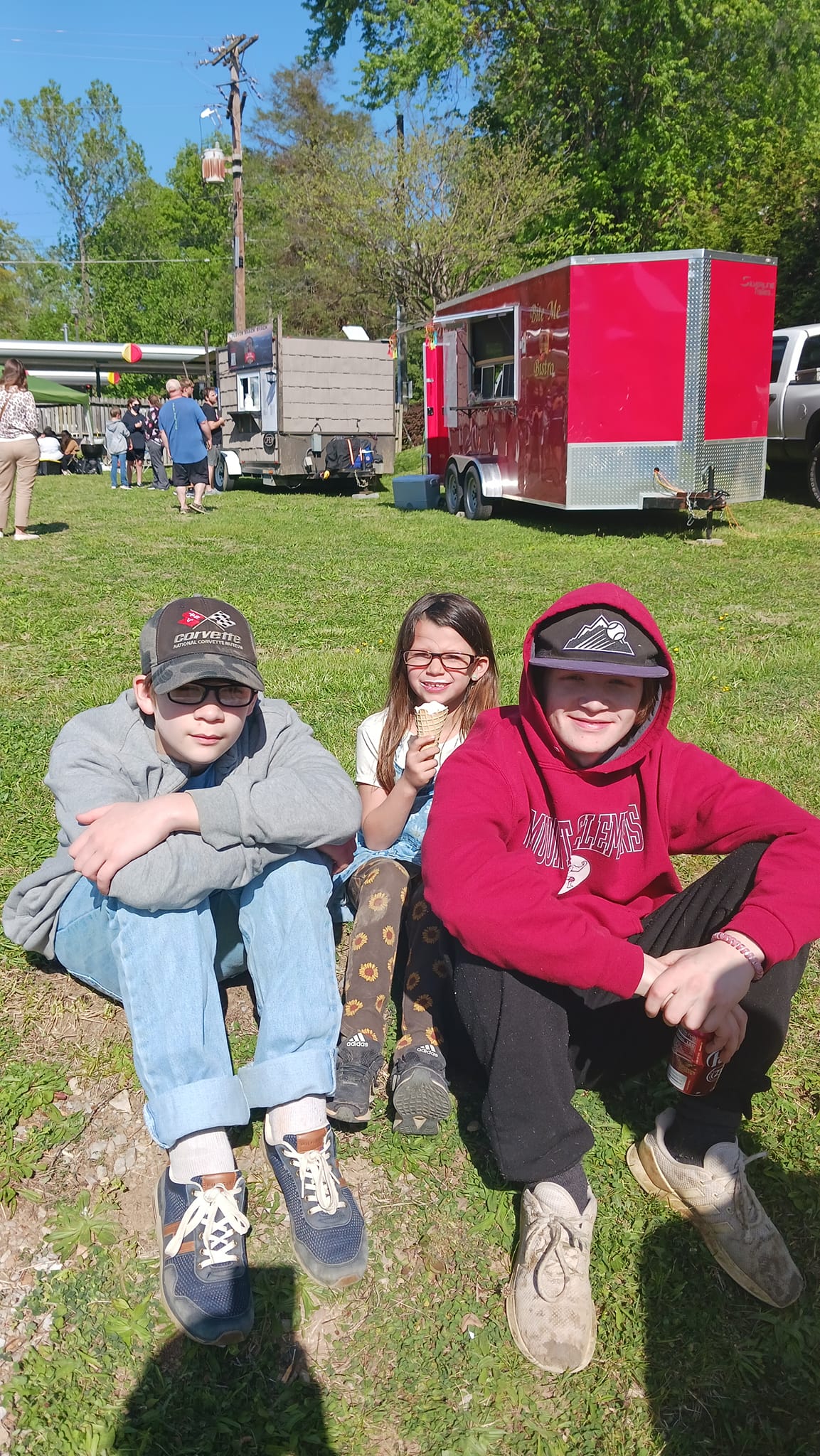 Riley, Landon, and Willow at a food truck rally in Rogersville