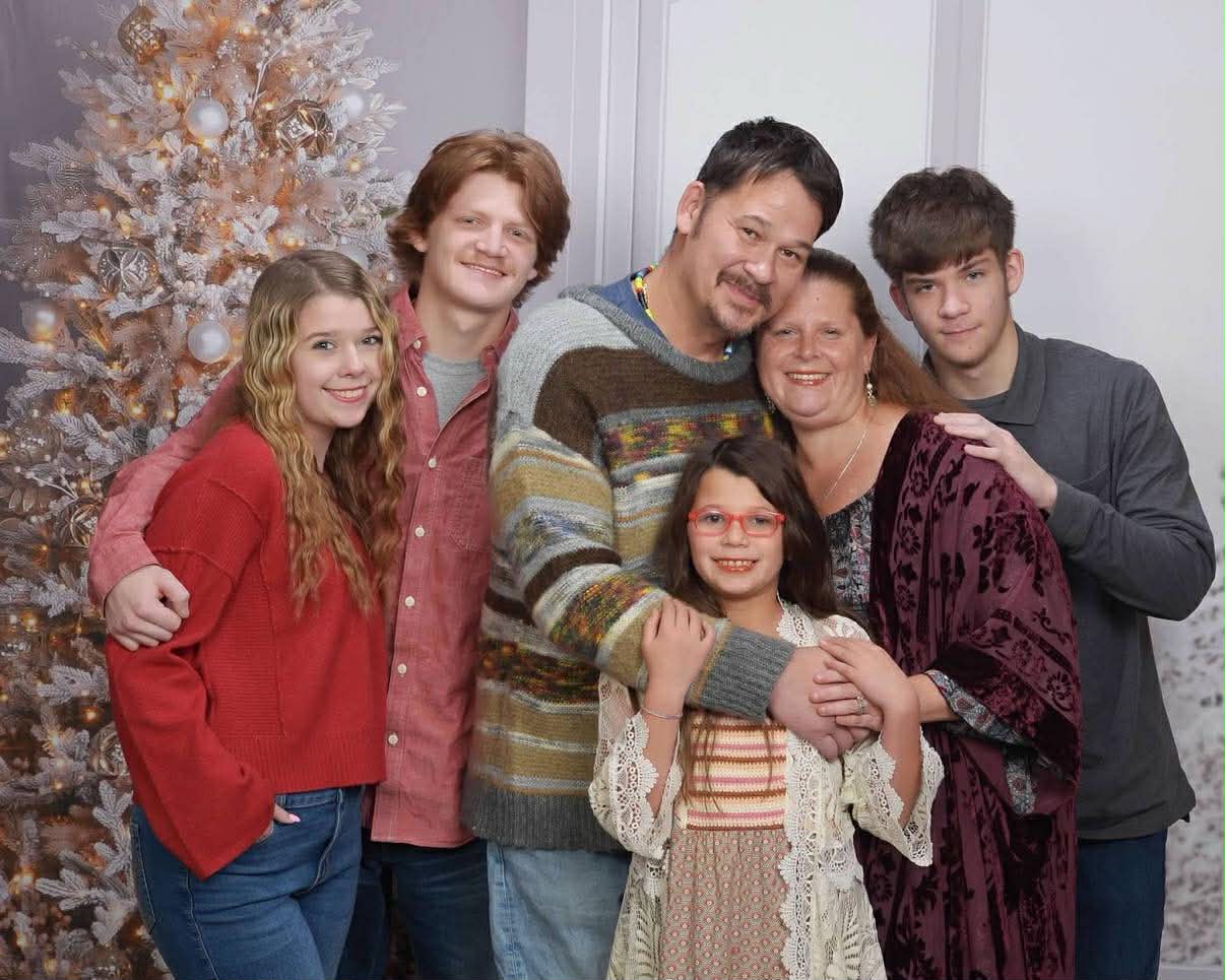 The whole family together at Christmas, including Riley's girlfriend Abby