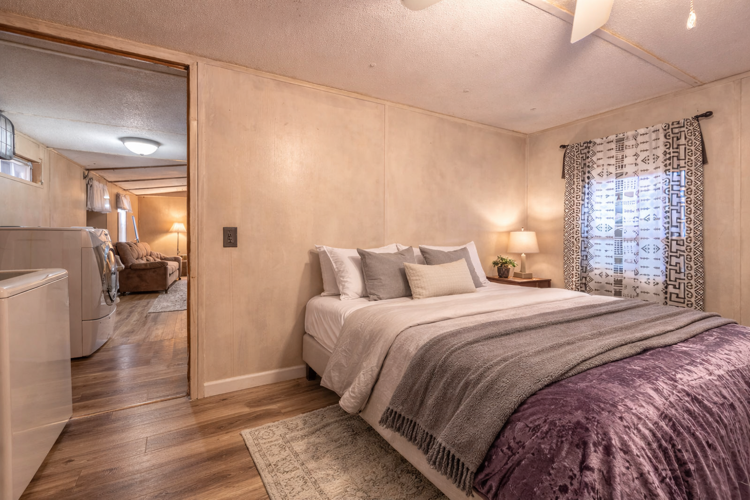 Primary bedroom with updated flooring